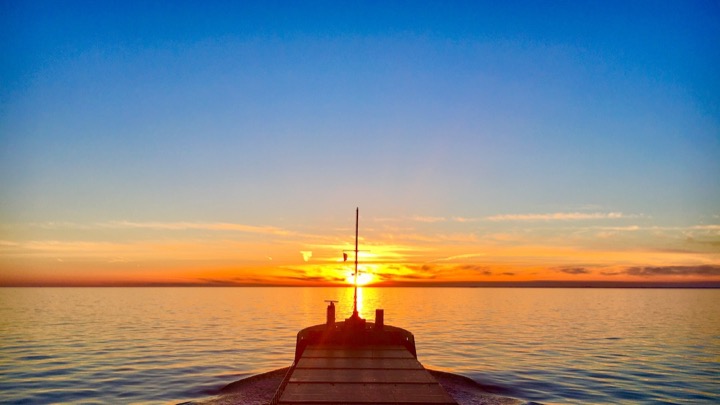 Sunset over calm waters
